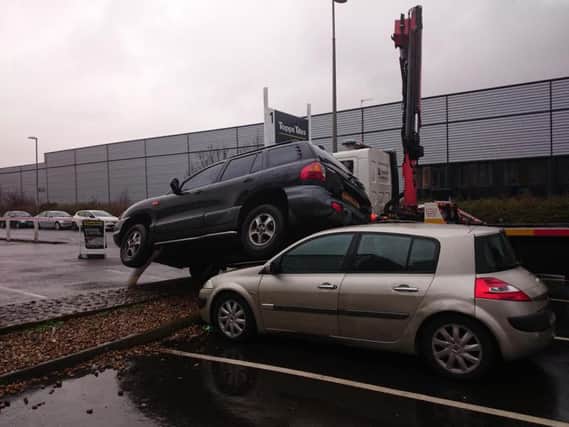 Oops... A driver reversed their car onto another parked vehicle in a Lewes retail park. Photo by Peter Calladine. SUS-151222-124228001