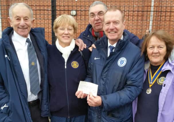 Shoreham and Southwick Rotary Club president Liz Box, far right, with, from left, Rotarians Dr David Gordon and Val Trevor, Tony Kybett and Matthew Major from Sussex FA
