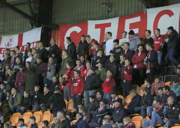 Crawley Town fans get behind their team at Barnet SUS-151221-112517002