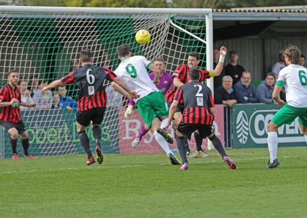 The Rocks and Lewes do battle at Nyewood Lane on Boxing Day / Picture by Tim Hale