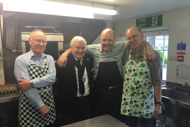 Worthing mayor Michael Donin with breakfast club volunteers at St Clare's Day Centre