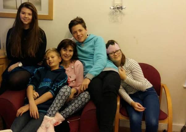 Amanda Newton with her four children when they visited her in hospital on Boxing Day
