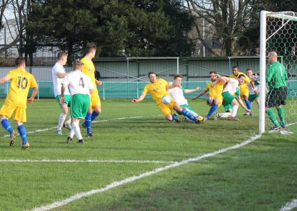 Goalmouth action in City's win over pagham / Picture by Roger Smith