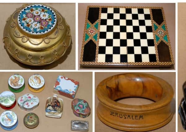 Antiques stolen in Sussex burglaries.