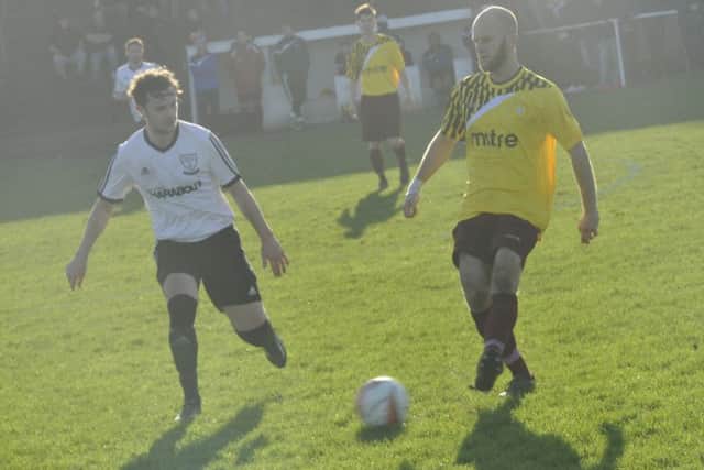 Little Common player-manager Russell Eldridge on the ball against Bexhill United. Picture by Simon Newstead (SUS-151228-212045002)