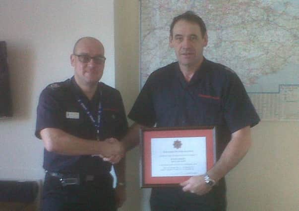 Horsham watch manager Kieran Smith (right) retiring after 35 years