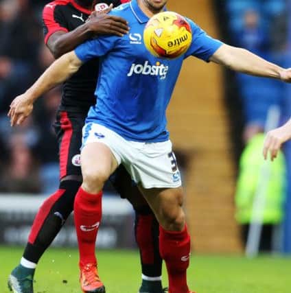 PortsmouthÃ¢Â¬"s Enda Stevens battles with CrawleyÃ¢Â¬"s Roarie Deacon during the Sky Bet League 2 match between Portsmouth and Crawley Town at Fratton Park, Portsmouth, England on 2 January 2016. PPP-160201-152817006