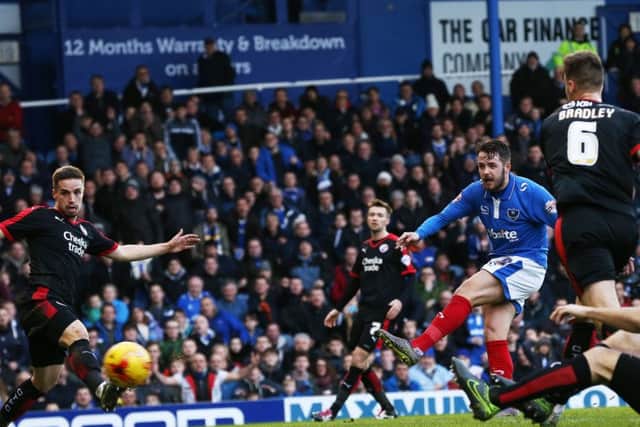 PortsmouthÃ¢Â¬"s Marc McNulty scores his first goal of the match during the Sky Bet League 2 match between Portsmouth and Crawley Town at Fratton Park, Portsmouth, England on 2 January 2016. PPP-160201-153557006