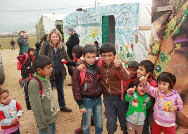 Outside one of the tent schools in Syrian refugee camps
