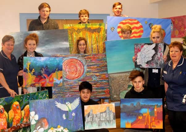 Collyers BTEC Level 3 Art students proudly show-off their work SUS-160125-112557001