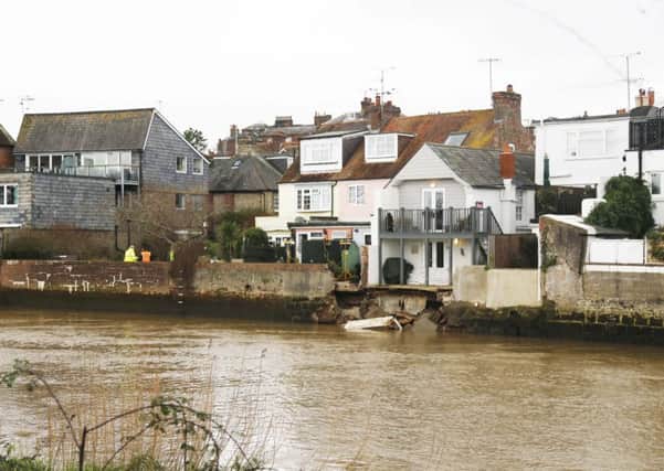 The flood defence wall along River Road collapsed earlier today. All pictures Eddie Mitchell