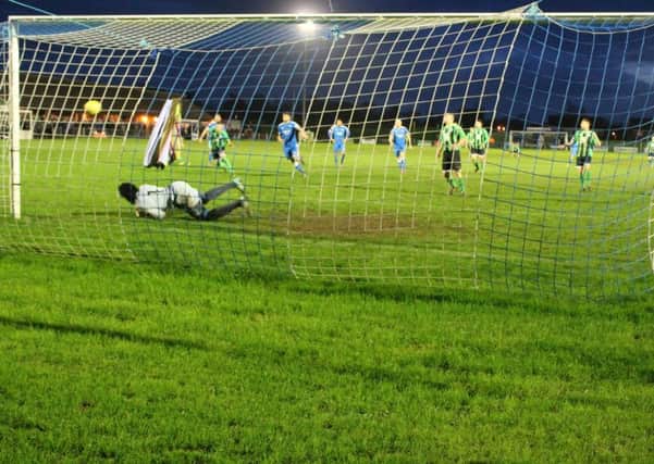 Leiston keeper makes a top penalty save.