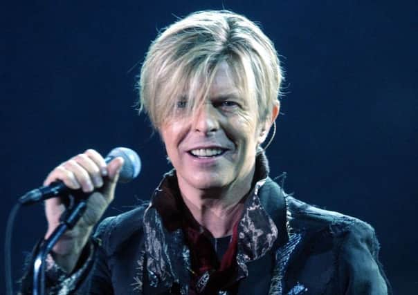 File photo dated 25/11/2003 of David Bowie who has been named the best-dressed Briton in history - beating two queens and a duchess to the title. PPP-140219-232148002