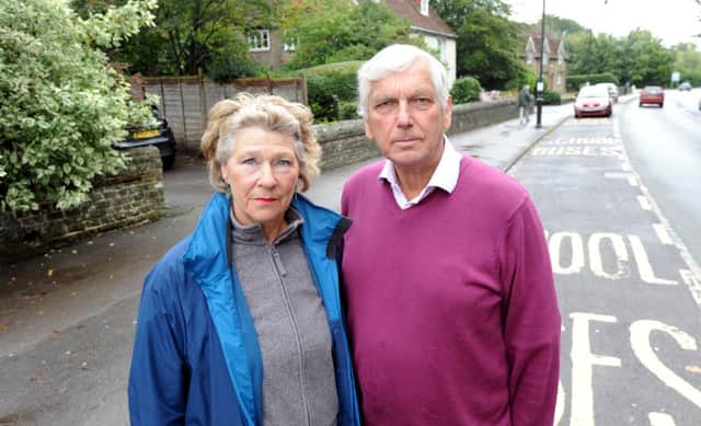 David and Angie Hargreaves outside the entrance to their house