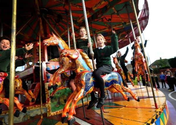 As part of the upper school's project about funfairs, a company has brought a merry-go-round into Greenway school. Pic Steve Robards   SR1600944 SUS-161101-172049001