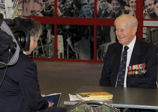 Fred Bailey, 92, from Bosham, being interviewed for BBC South Today after receiving the Legion dHonnour