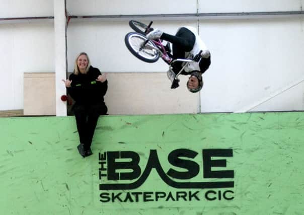 Mark Webb in action watched by skate park owner Janina Cooper. Photo by Derek Martin DM1610551a.jpg