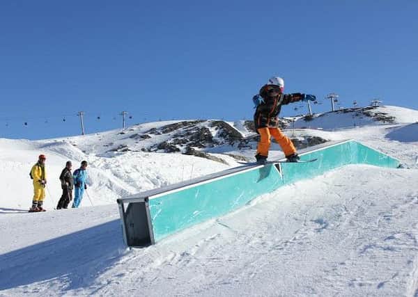 Charlie Lane snowboarding on his tour of Austria with the Great British elite squad