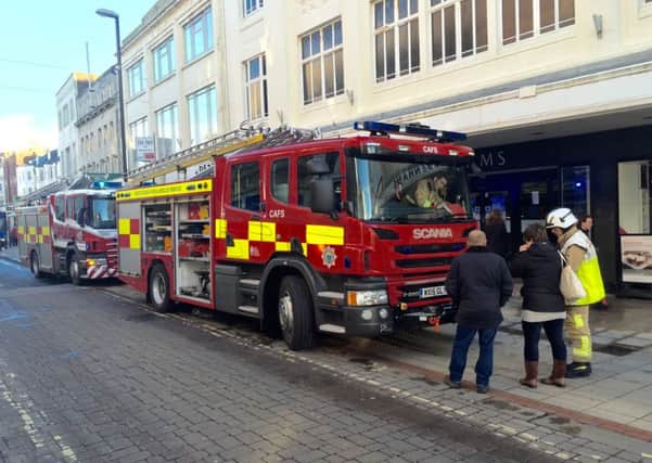 Firefighters at Debenhams in Worthing following the fire. Picture by Eddie Mitchell.