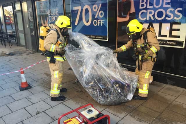 Firefighters at Debenhams in Worthing following the fire. Picture by Eddie Mitchell.