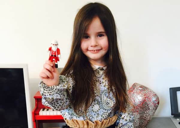 Isadora is reunited with her Playmobil Father Christmas SUS-160114-123227001