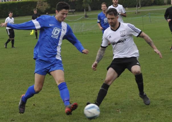 Andy Garman (right) is on his way from Bexhill United to Ringmer