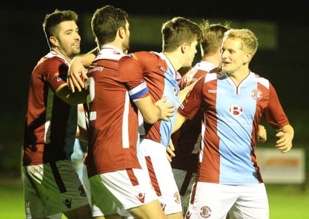 Hastings United celebrate one of their goals in the 5-2 win over East Grinstead Town on Tuesday night. Picture courtesy Scott White