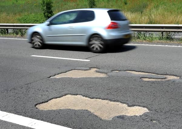 Potholes on the A27  between Chichester and Portsmouth. Pic Steve Robards SR1515030  01-07-2015 SUS-150107-181601001