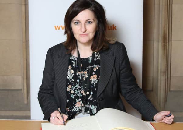 Eastbourne MP Caroline Ansell signs the Holocaust Educational Trusts Book of Commitment SUS-160120-144401001