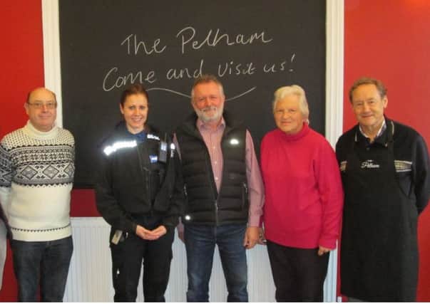 The Pelham staff with police community support officer Rachael Scott