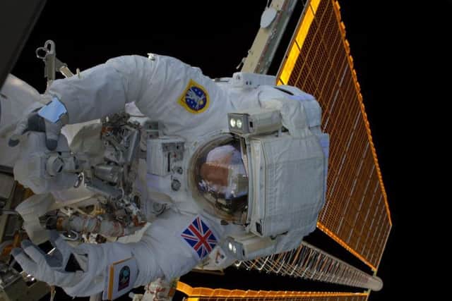 Tim Peake shared three photos from his spacewalk on Twitter. SUS-160116-103858001