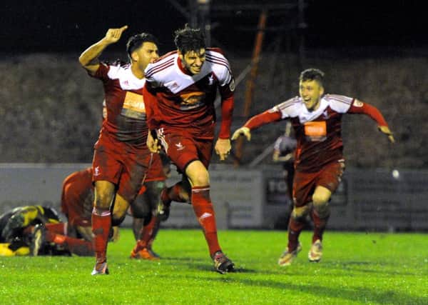 Action from Whitehawk's FA Cup second round replay with Dagenham and Redbridge earlier this season