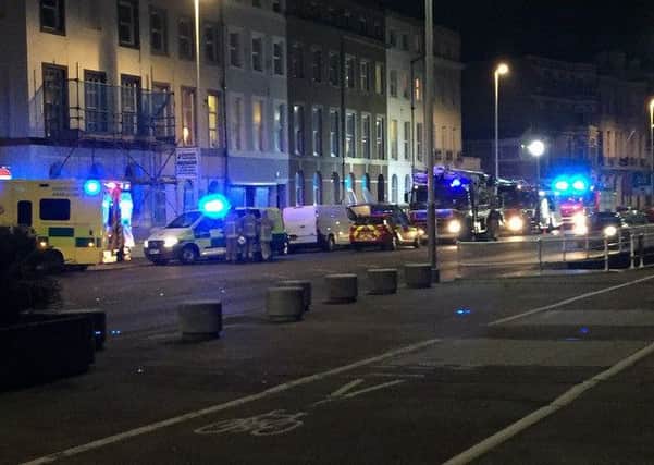 Fire engines and ambulances attend a basement fire on the St Leonards seafront. Photo by Chay Cusack