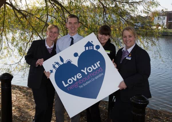Funeral co-ordinator Lorraine Cobb, food store manager Garry Farne, food store team leader Pam Howe and funeral co-ordinator Ali Davidson launch Love Your Neighbourhood
