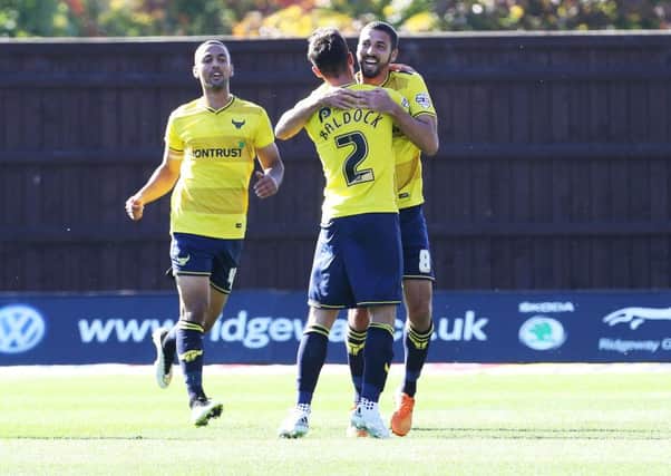 Oxford's Liam Sercombe celebrates scoring against Pompey earlier in the season. Picture: Joe Pepler
