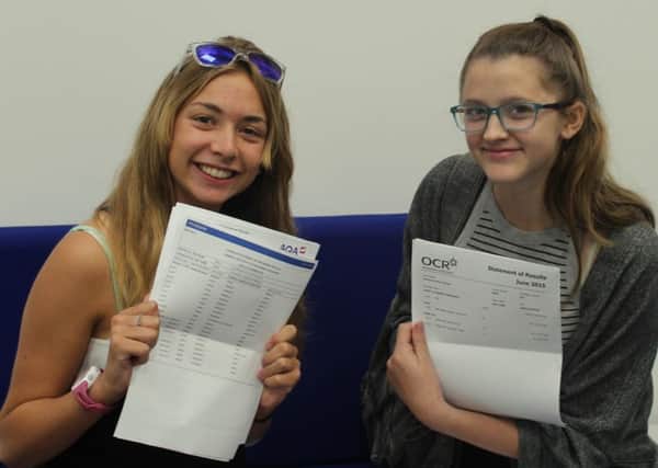 Josephine Edmunds and Beth Guest getting their GCSE results from Claremont School in August