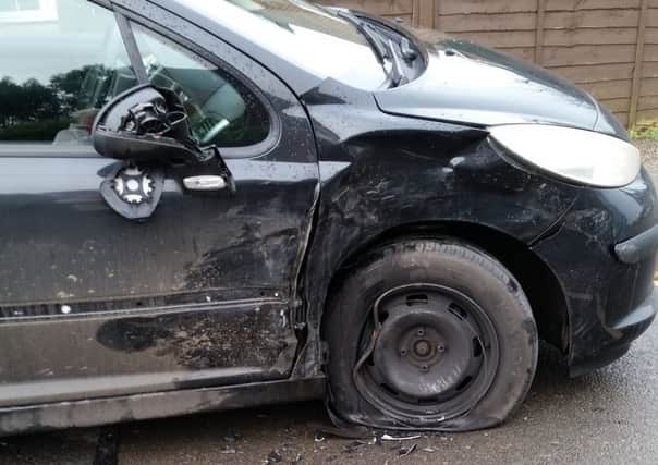 The Peugeot 207 was badly damaged in the hit and run