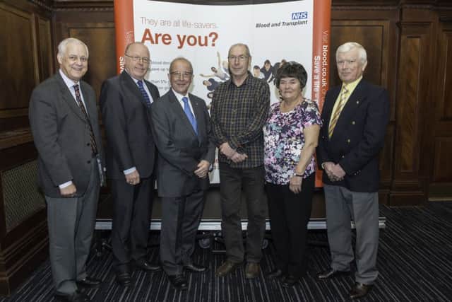 Donors from West Sussex who received 100th Donation Awards including John Williams , second from left. SUS-160122-110409001