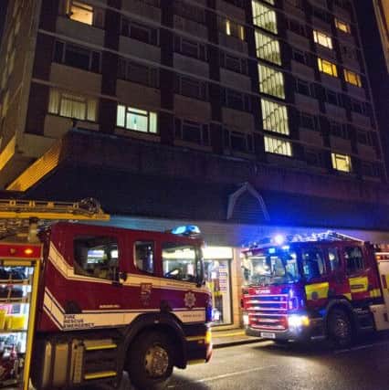 Firefighers at a high rise in Haywards Heath. Photo by Eddie Howland SUS-160124-111003001