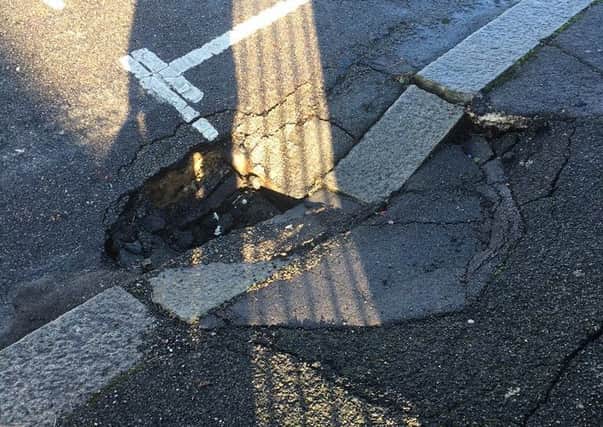 A 'sink hole' on Linton Road. Photo by Michael Stringer