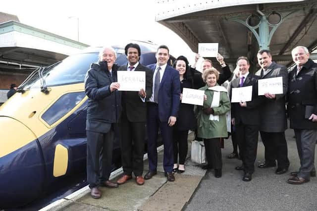 Bexhill and Battle MP Huw Merriman pictured with district councillors campaigning for high-speed rail SUS-150402-123549001