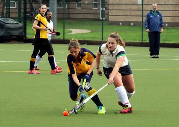 Jenna Greenaway (white shirt) on the ball for Chi against Worthing / Picture by Kate Shemilt