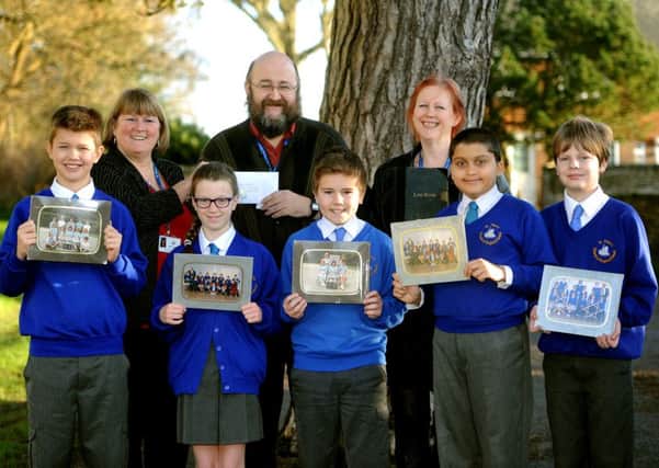 Family of ex-headmaster donates funds to school to be used for defibrillator at St Mary's C Of E Primary School, Normandy, Horsham. Pic Steve Robards   SR1602879 SUS-160125-160656001