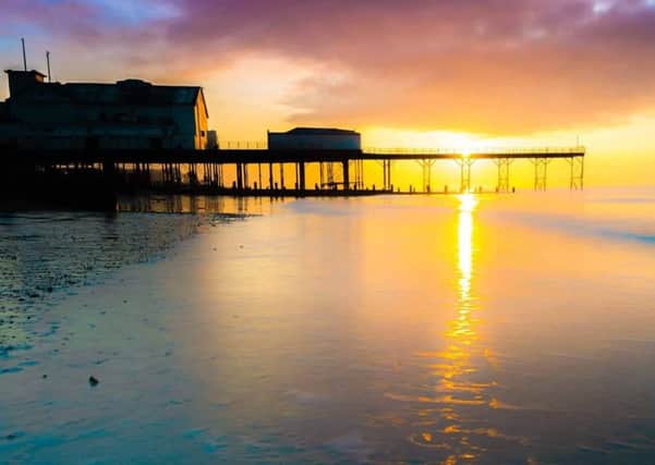 Darren Collyer's entry into the 2016 photographic competition of Bognor Pier Trust shows the sun over the pier