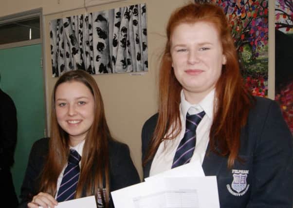 Sophie Millard, left, and Vicky Clegg with their mock exam results at Felpham Community College