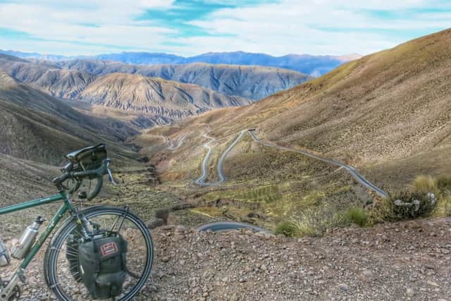Slinfold man Neil Churchard cycled around the world to raise money for Unicef. Pictured at the Cuesta de Lipon in Argentina - picture submitted