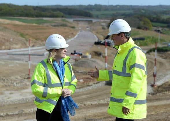 Amber Rudd and David Cameron at the link road site