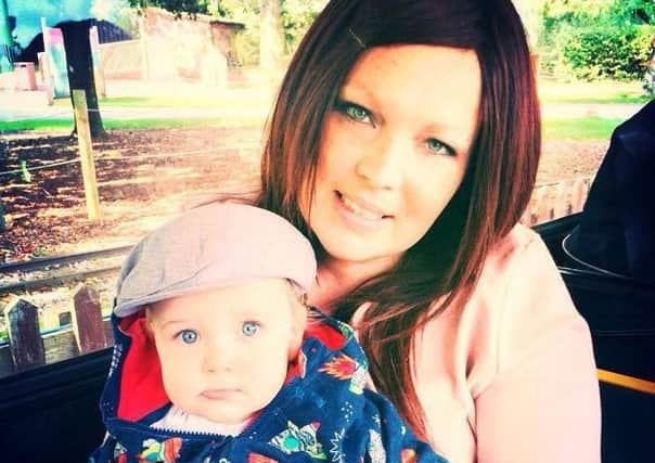 Janine Taylor, 34, with her 14-month-old son Mason