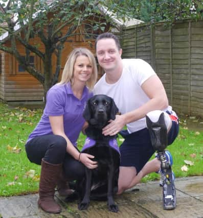Sara Trott and Mike Goody with canine partner Kathy