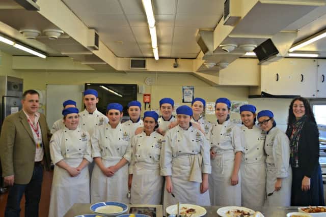 First year hospitality and catering students with chef Luke Hackman, from The Gribble in Oving, and Rosie Alverez, La Saucy Salsa founder